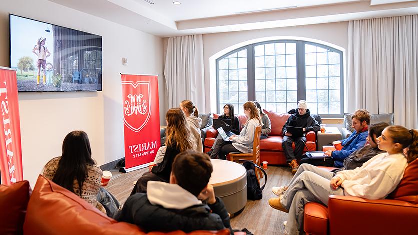 Marist students gather in Ward Hall to watch and rate Super Bowl Ads. Photo by Nelson Echeverria/Marist University. 